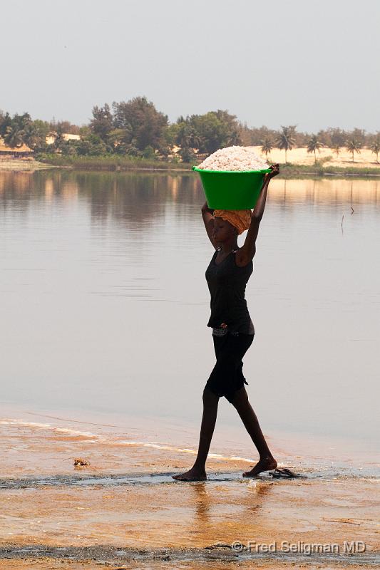 20090529_140547 D300 P1 S1.jpg - Lady carrying 130 lb of salt, Pink Lake